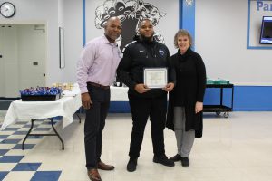 Board Award recipient Arthur Johannes poses with the certificate he received at the Board Awards ceremony 