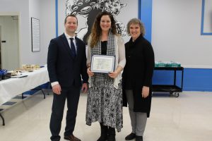 Board Award recipient Stephanie Byrne poses with her certificate