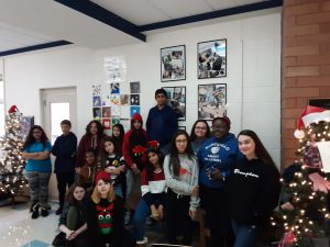 Group of about 15 middle school students who were responsible for the giving tree