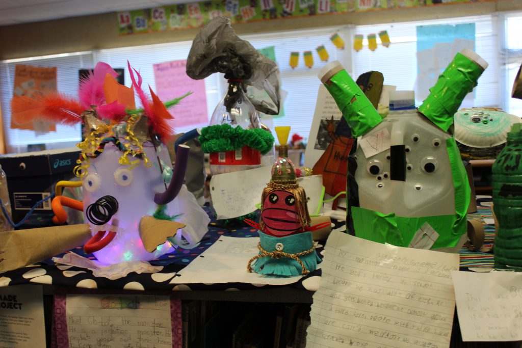 A group of monsters made from recyclable objects