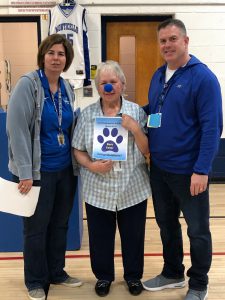 Barb Feller poses with Principal Michelle Knowlton and Assistant Principal Doug Murphy during the Fun Friday Award Ceremony