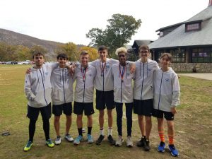 the top 7 monticello runners pose 