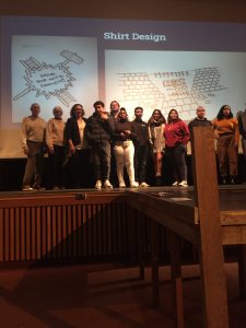 Academy of Finance students stand on stage 