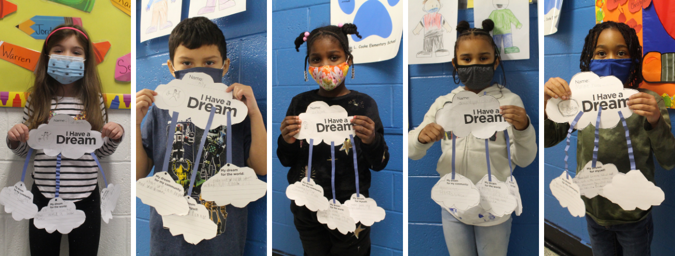 a grid of photos. Each photo is of a different student holding up a craft 