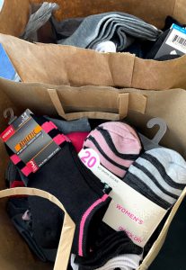 a box of socks to be donated 