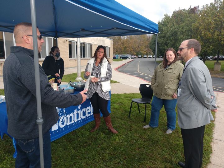 Dr Evans is speaking with community members during his "Another Cup of Coffee" event