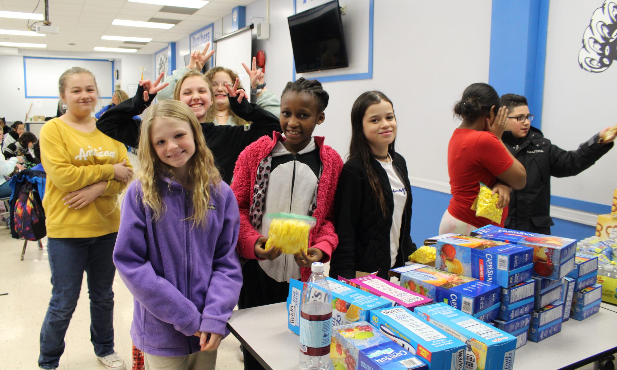 a group of students is smiling