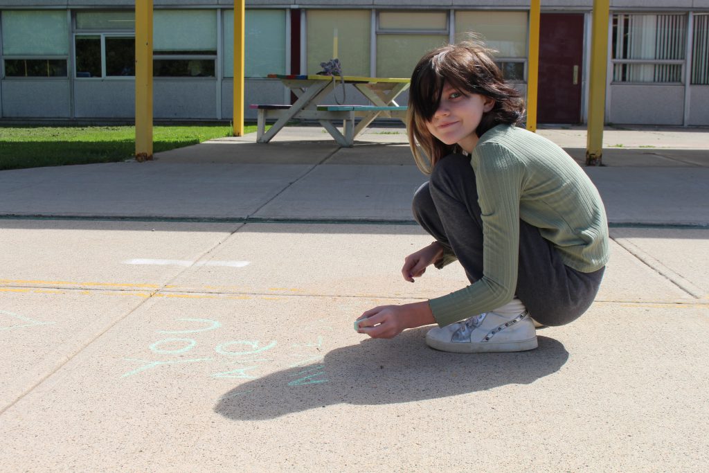 a student is smiling 