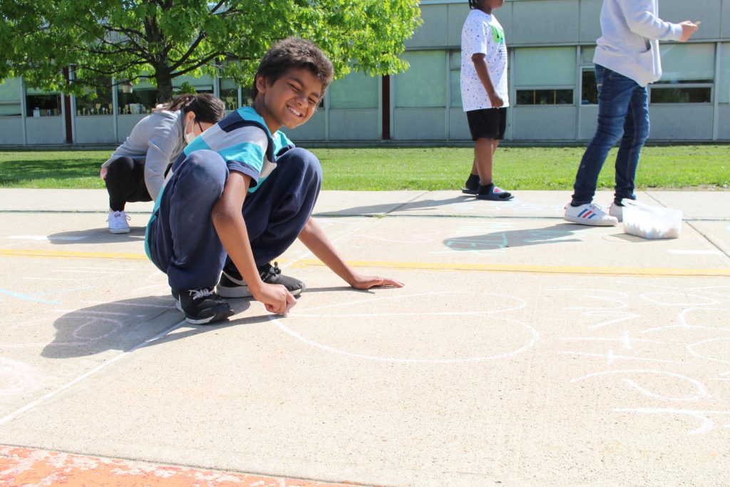 a student is smiling 