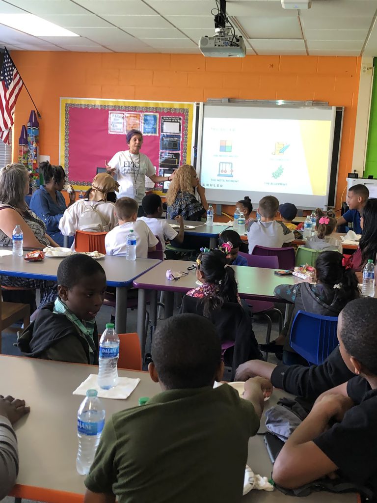 Elisa Mendels, SEW Facilitator of Cooke Elementary School and EPIC facilitator is speaking to attendees at the RULER workshop.