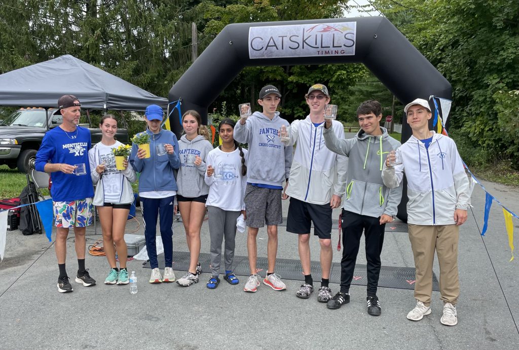 the cross country team at the finish line