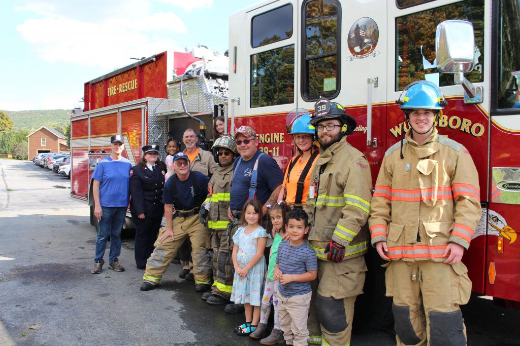Members of the Wurtsboro Fire Department pose with Chase students