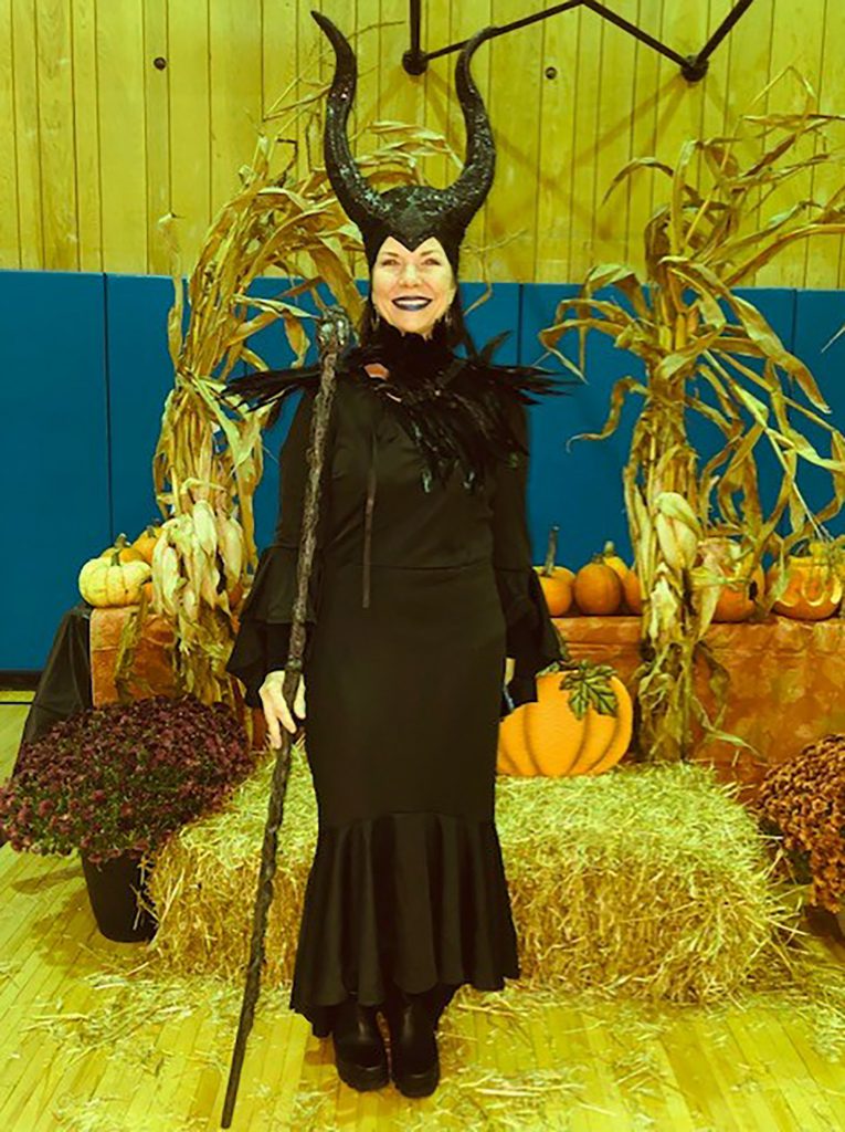 Woman in a Maleficent costume.