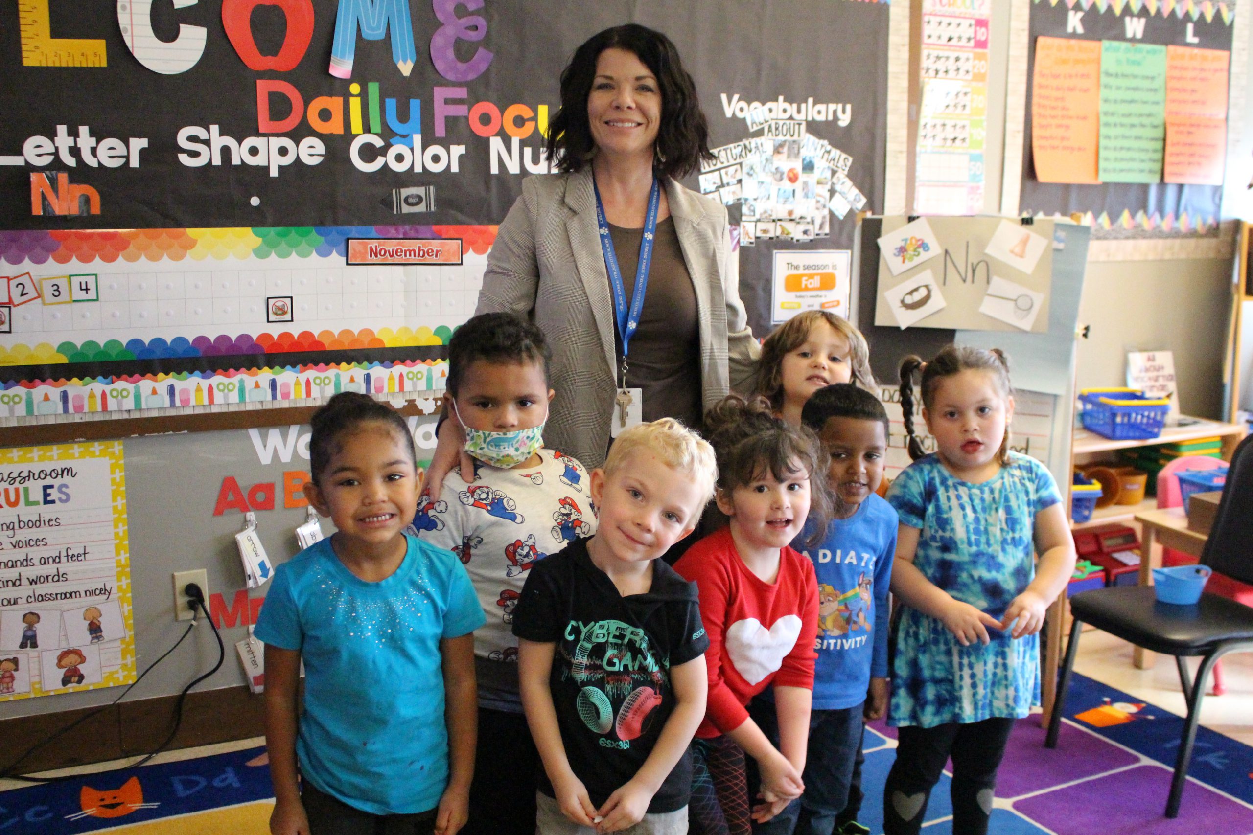 a group of students are posing with their principal