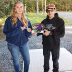 two students are holding