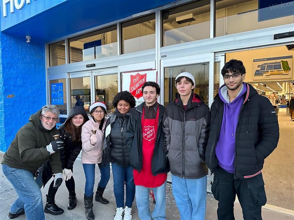 Students standing in front of Walmart.