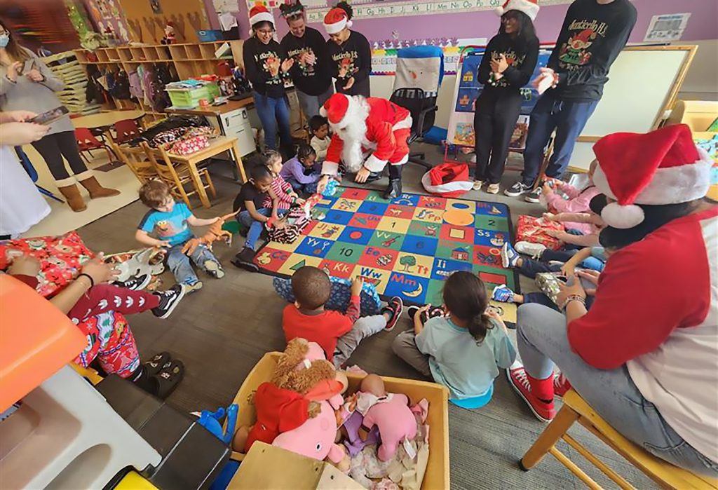 Children opening gifts.