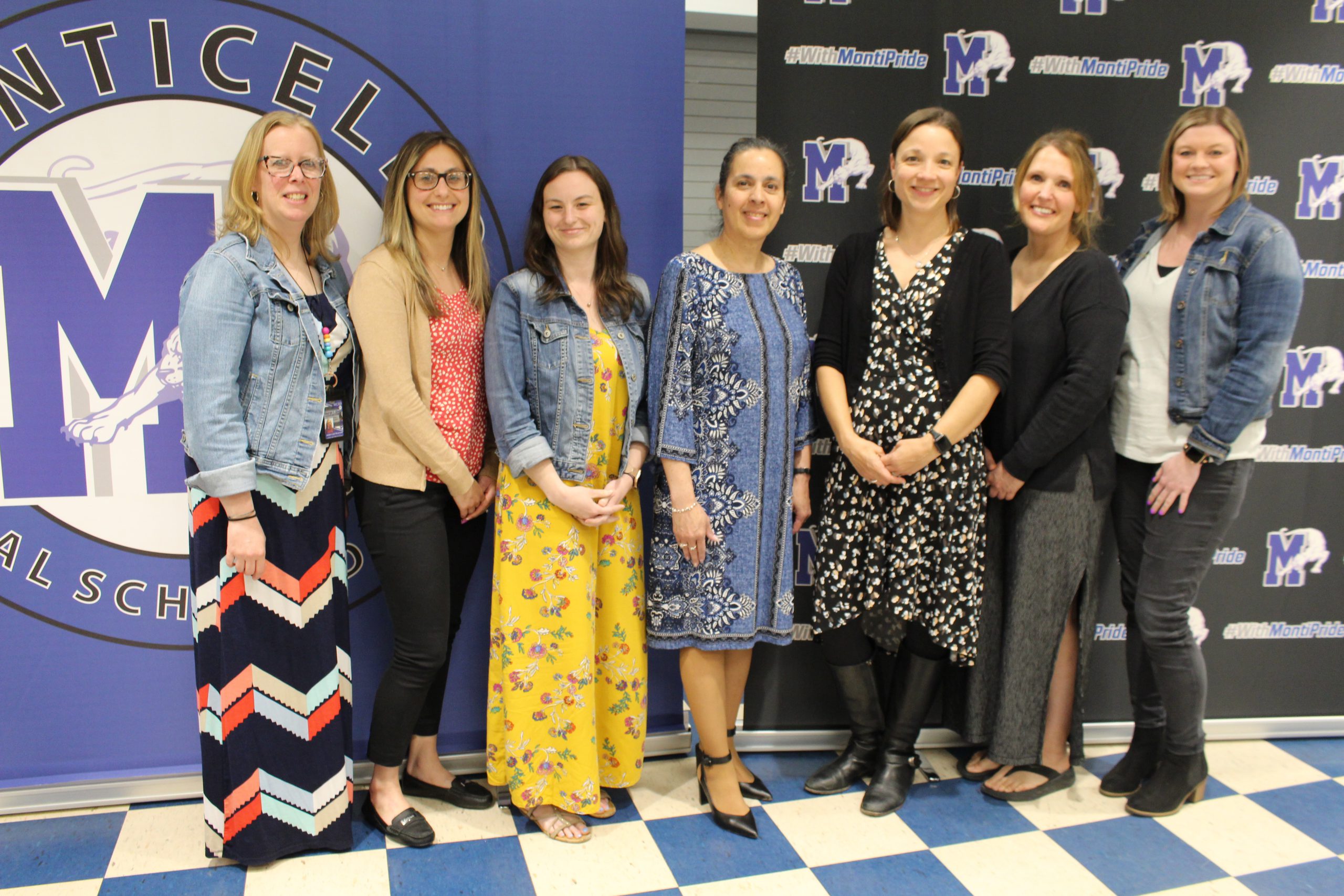 a group of educators are posing