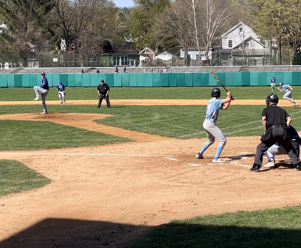 baseball players are in the middle of a game 