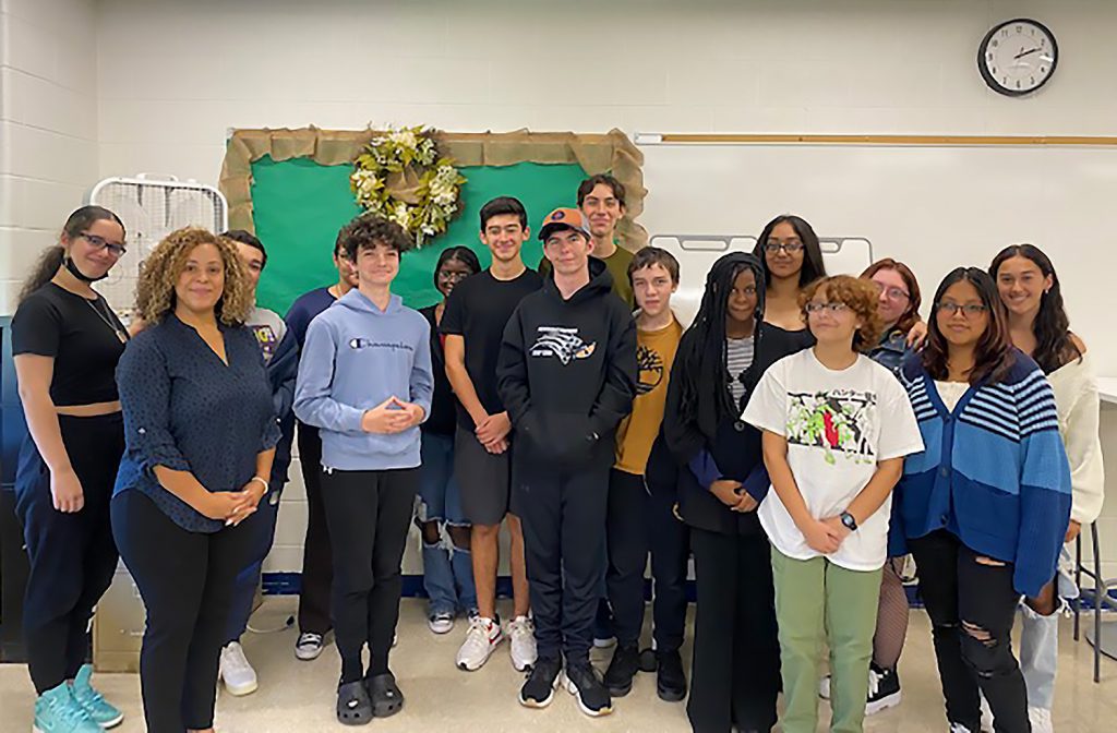 Lynka Rivera with high school students.
