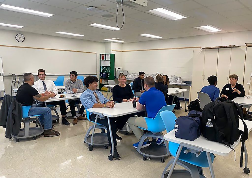 Students meeting mentors.