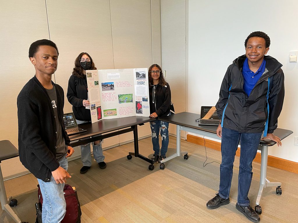 Four students presenting their project.