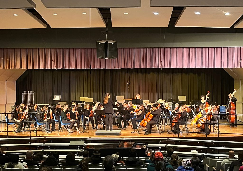 Student musicians on stage.