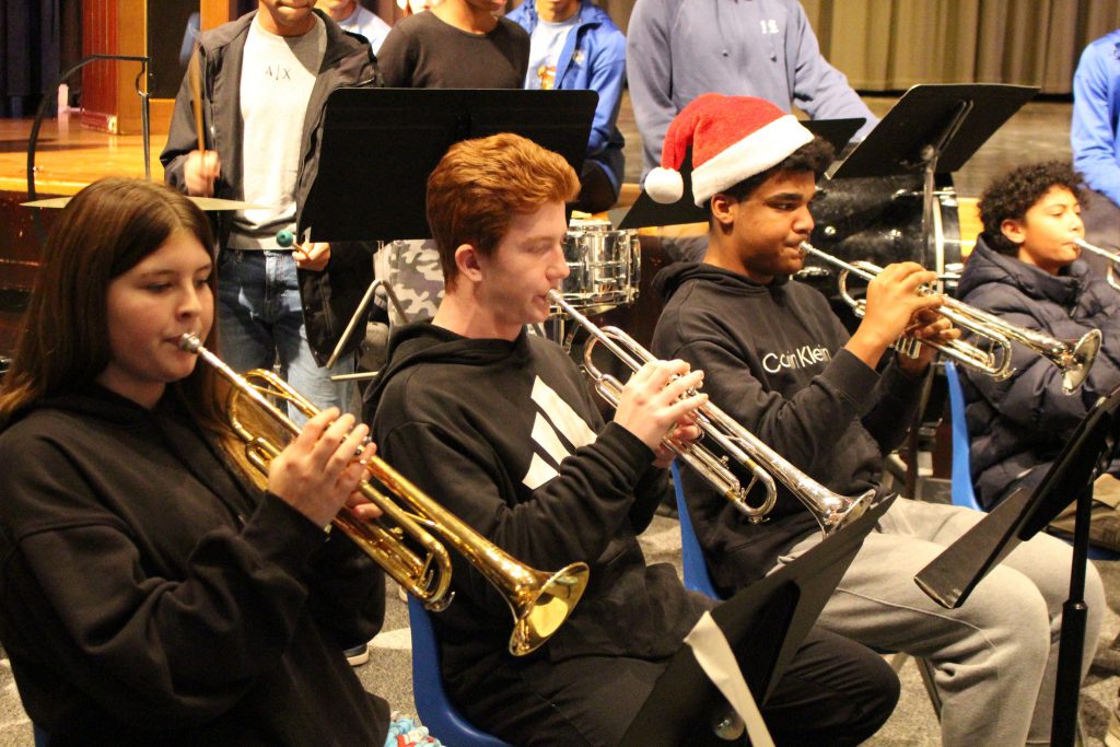 Student musicians playing trumpets.