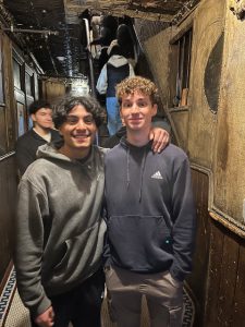 two students are posing at the tenement museum 