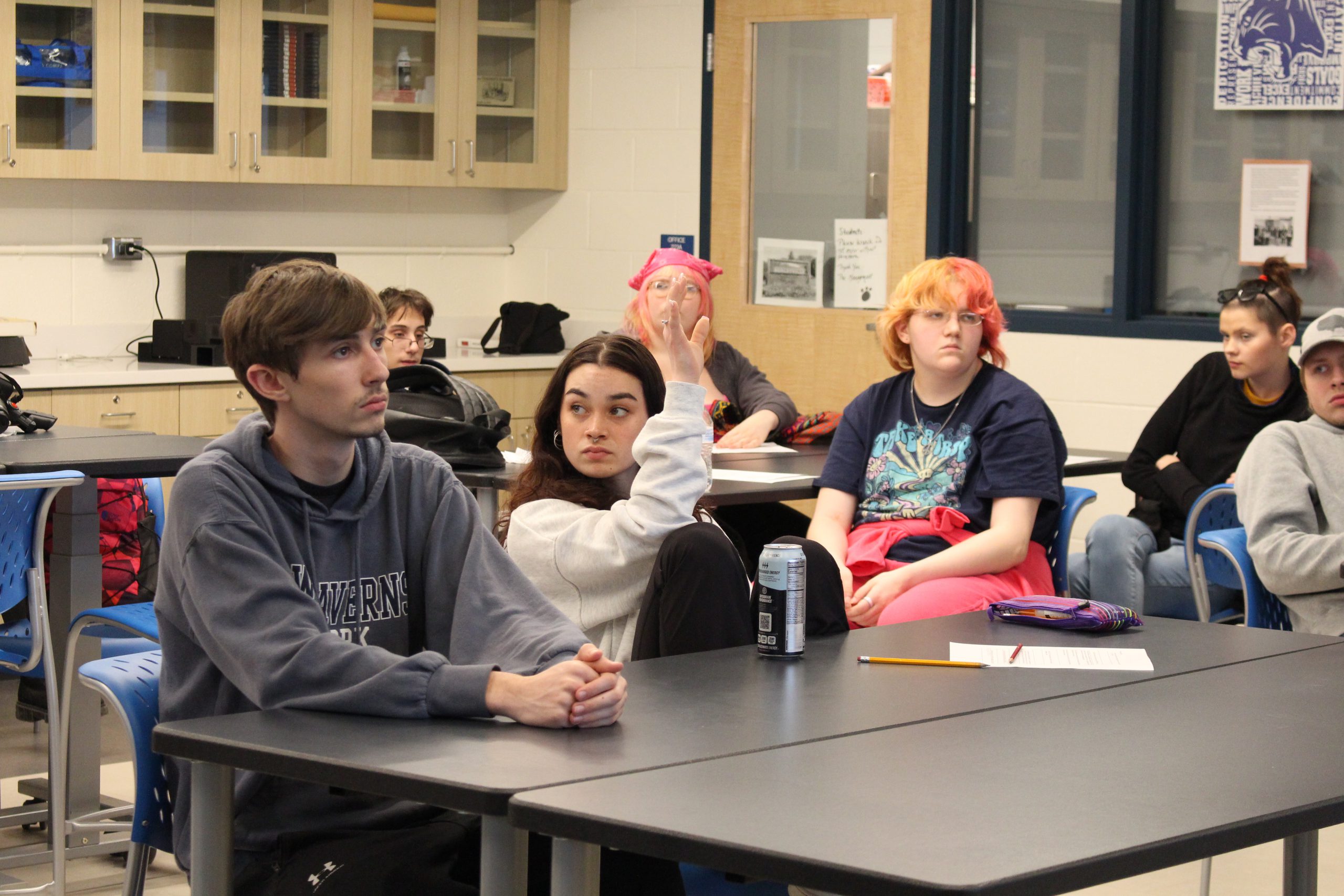 students are engaged in a discussion. 