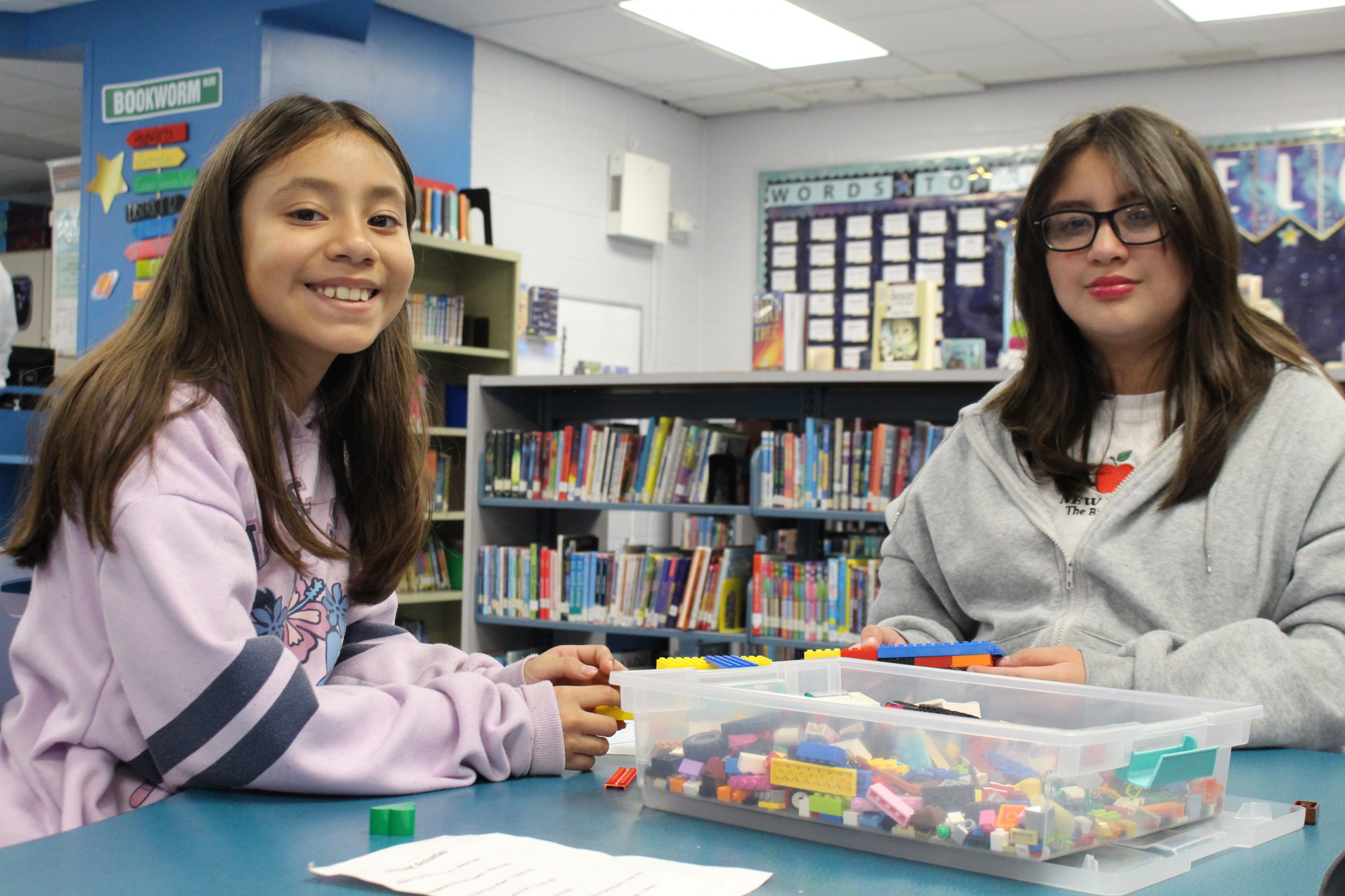 Two students work on a project 