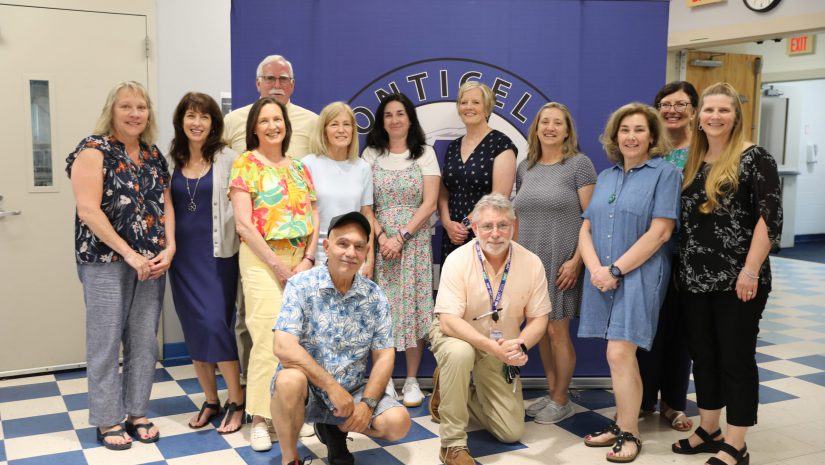 a group of retirees are posing