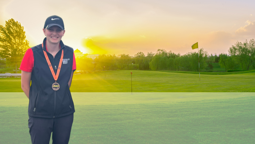 Abby Morse is posing on a golf course