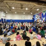 the entire school is assembled in the auditorium