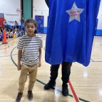 a student is smiling for the camera