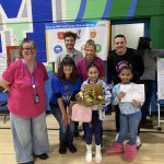 a group of students and teachers pose