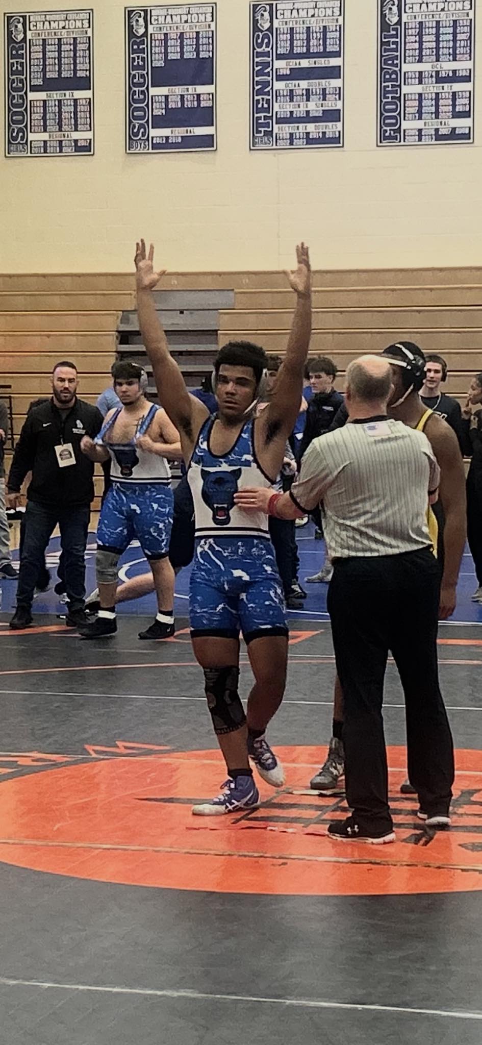 Wrestler Dion Knight on the mat. 