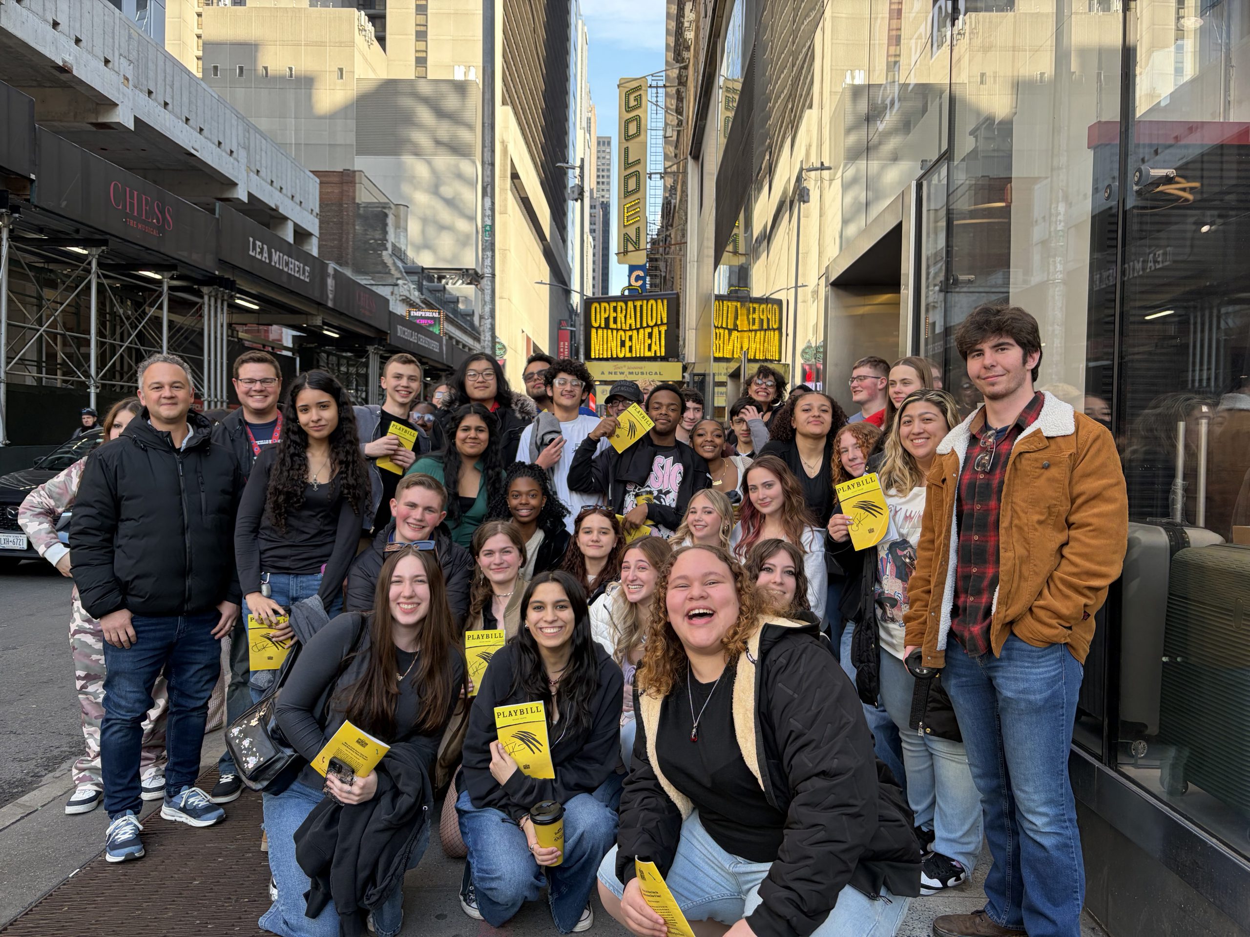 a group of students pose outside of operation mincemeat