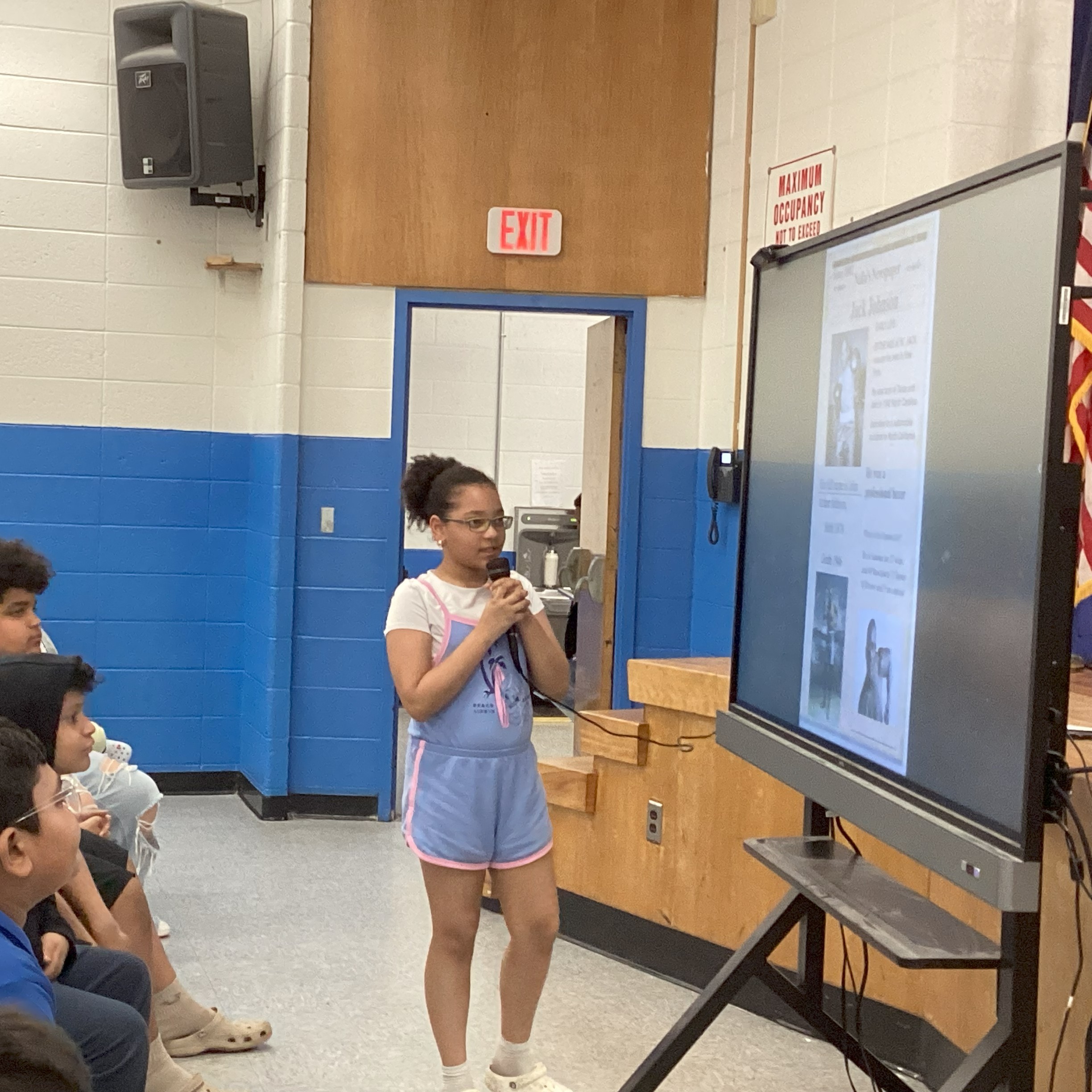 a student presents to her classmates