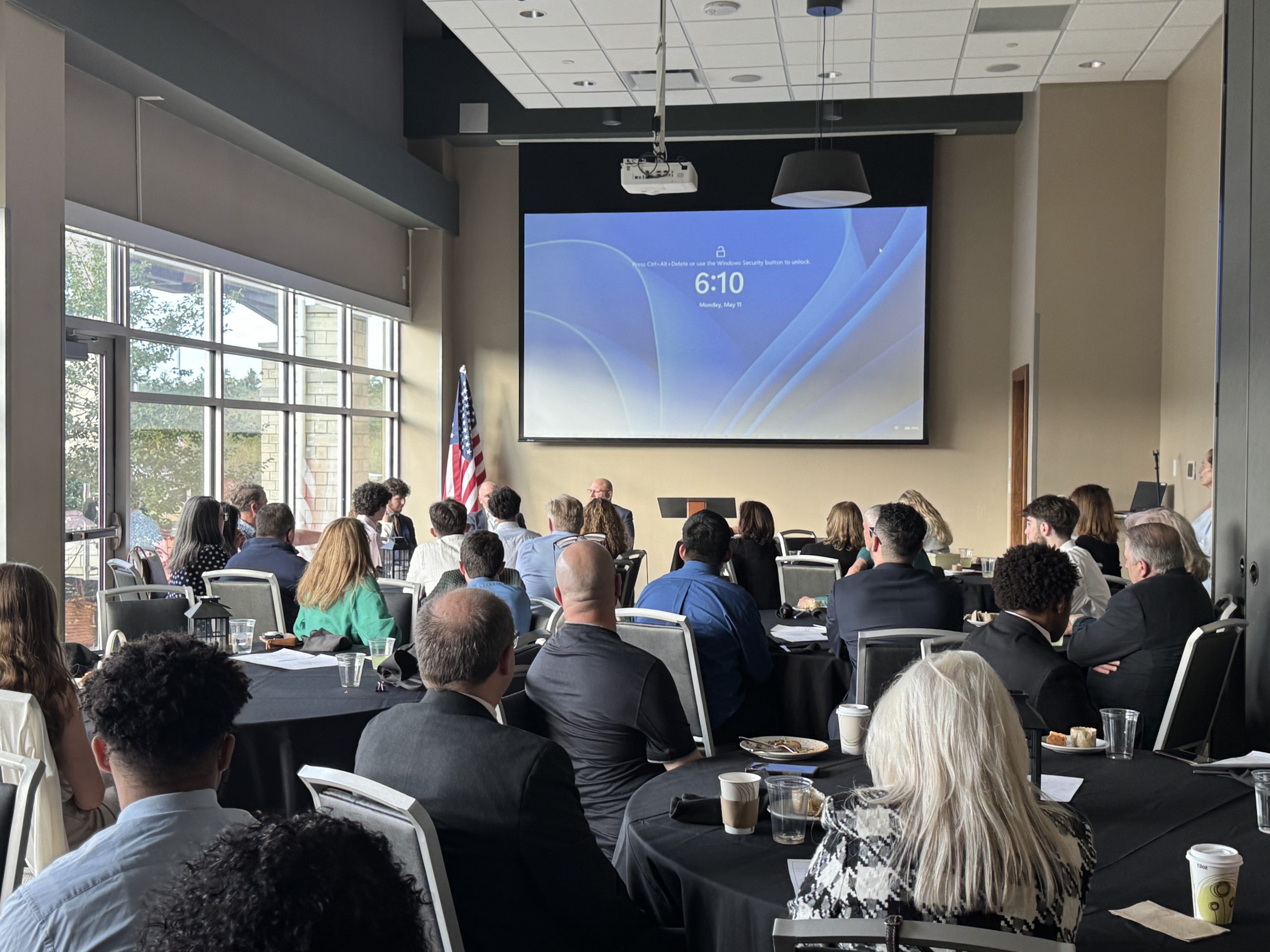 shot of a room filled with students and AOF board members
