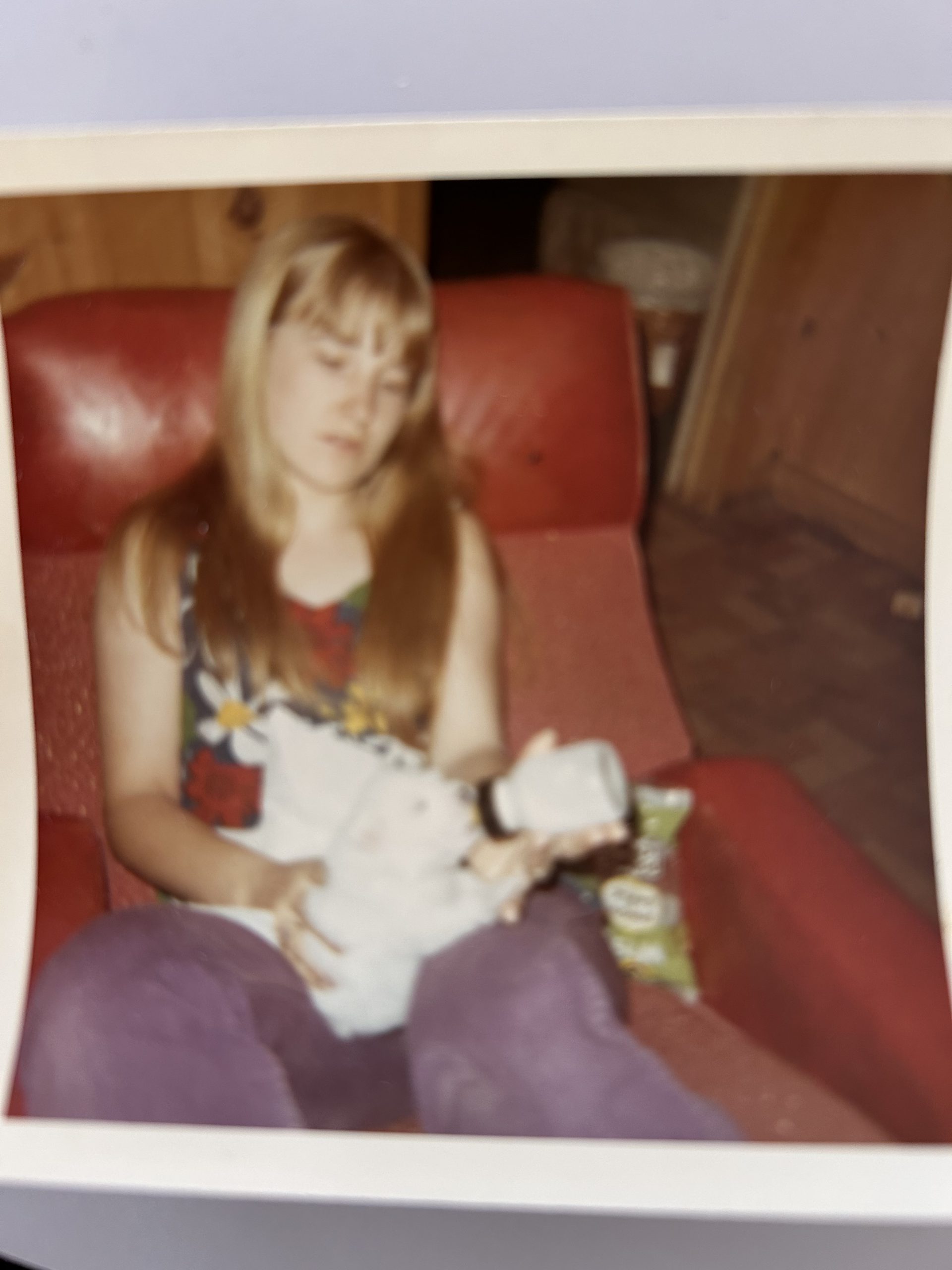 childhood photo of Ms. Masters with puppy