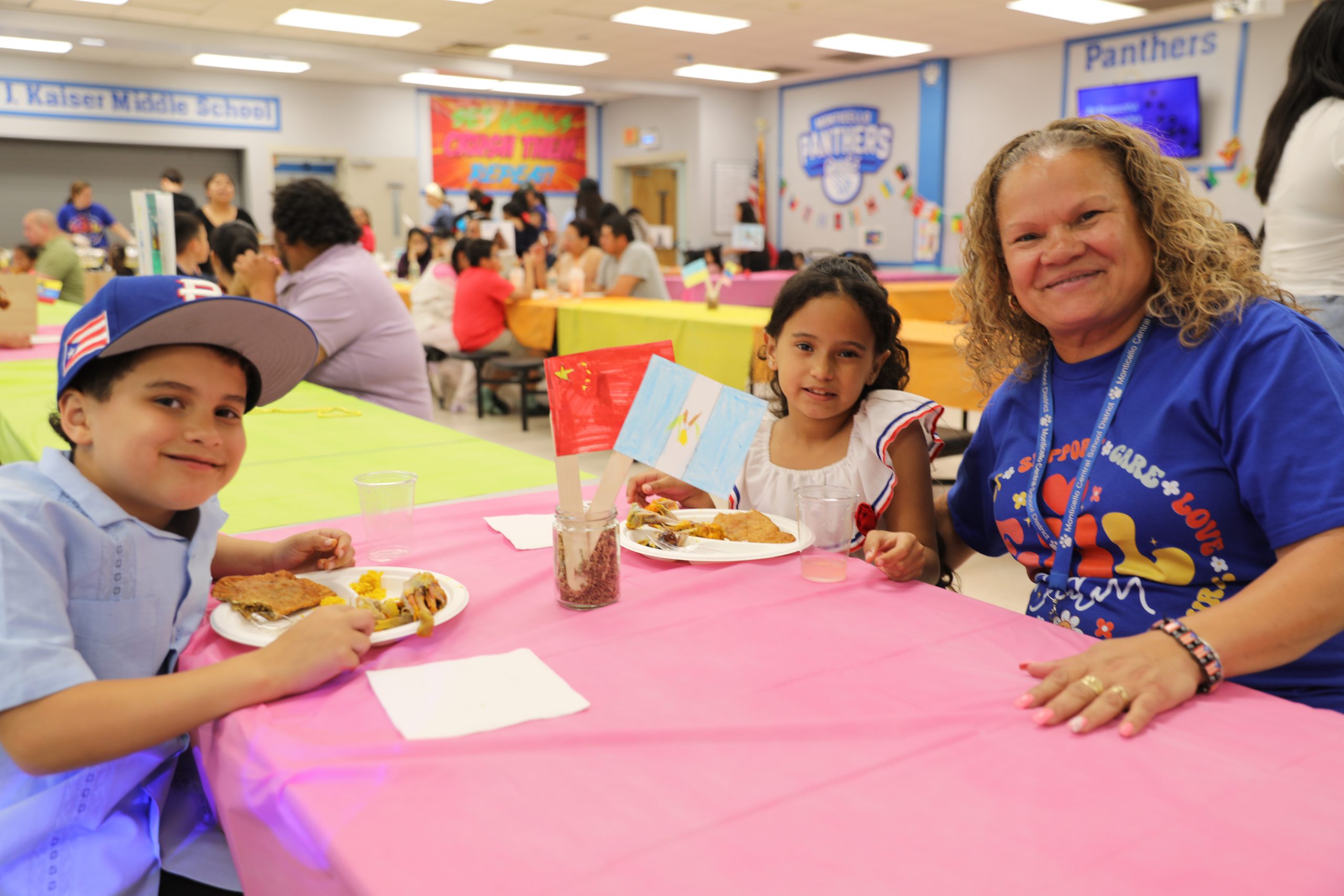 a family is enjoying a meal at ENL night