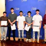 a CTE student poses with their award at the ceremony
