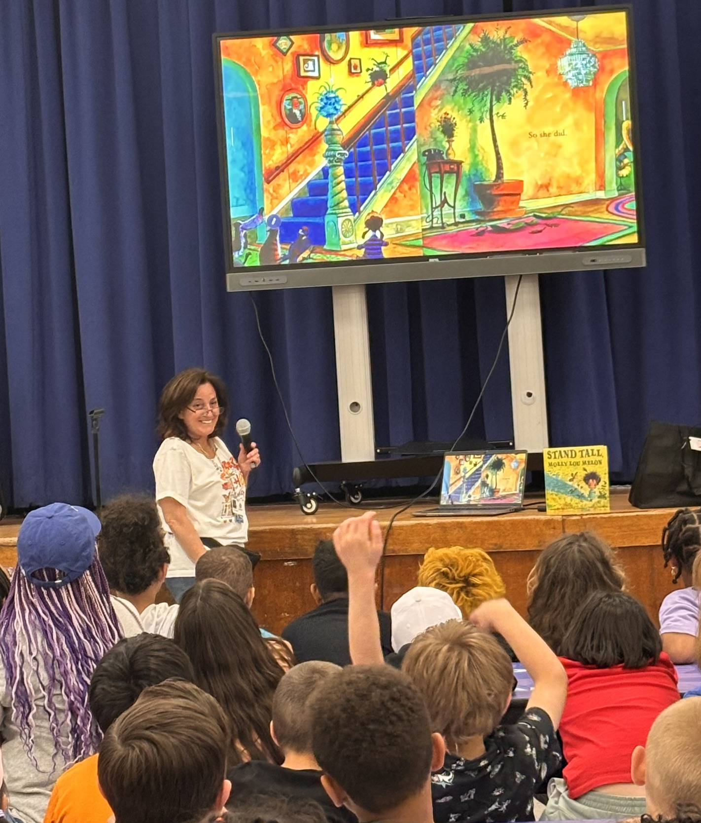 Jane Sorensen reads to students