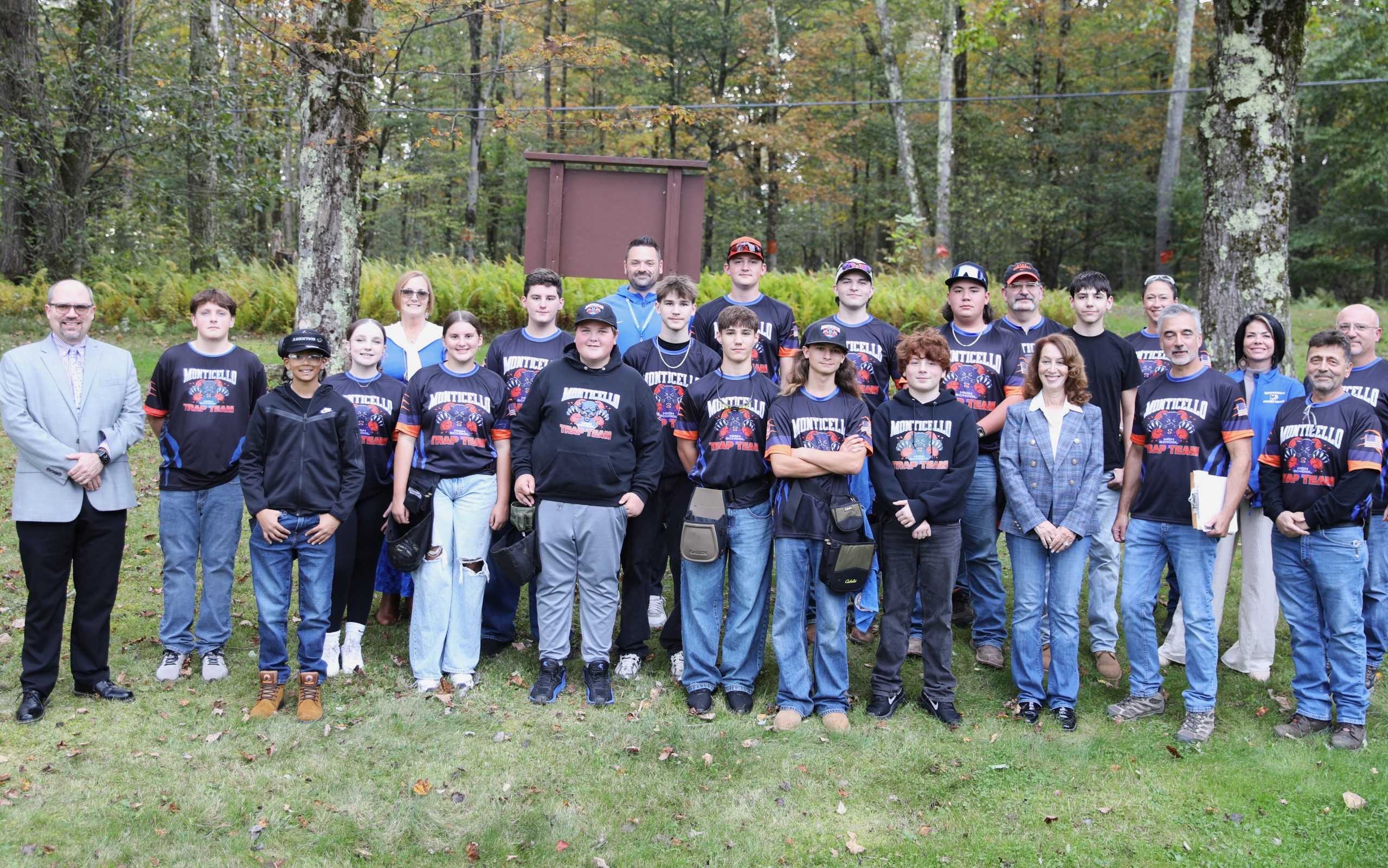 Assmeblywoman Kay poses with the Monticello High School trap team, coaches and district administrators